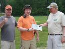 Harrsion Williams, KB1UOD, off from college for the summer, receives a copy of the ARRL Antenna Handbook from Tom Perkins, AC1J. Granite State ARA President Dennis Markell N1IMW gives a thumbs up !